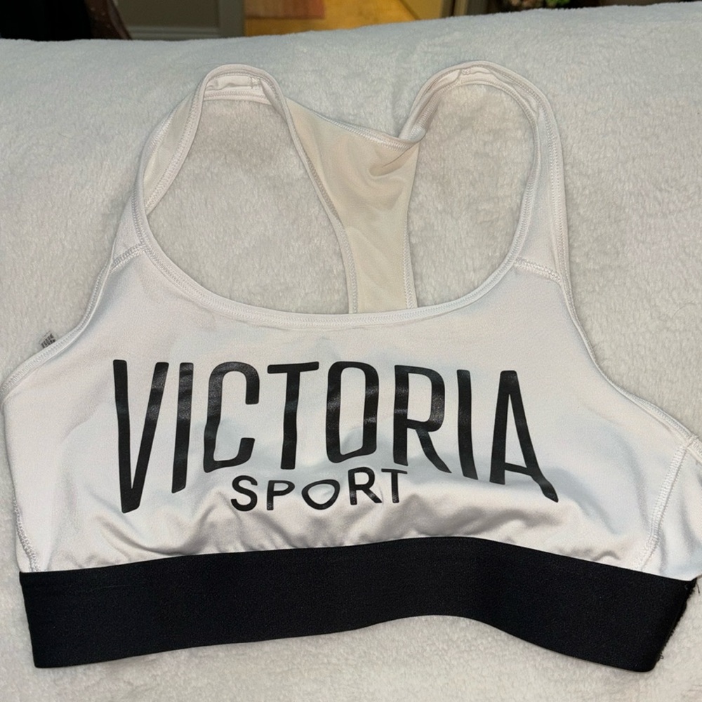 Victoria secret white sports bra. Black writing. Great condition. Size medium !